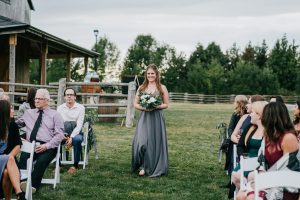 bridesmaid walking down the aisle
